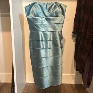 Pretty turquoise above the knee strapless dress